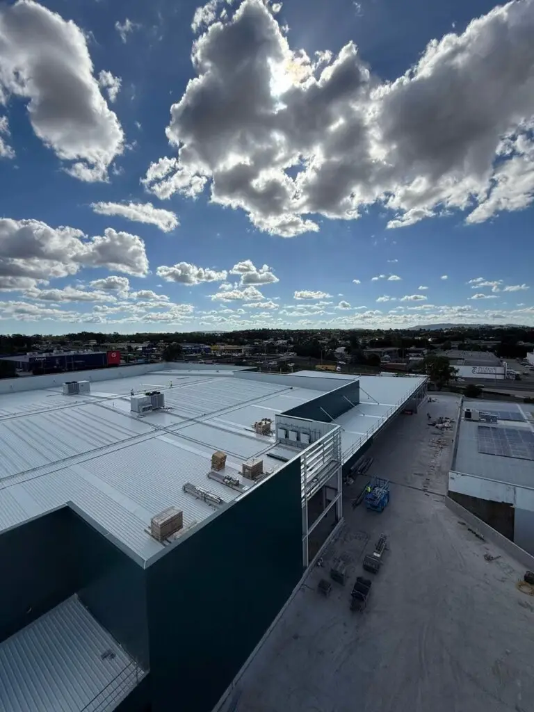 Commercial Roofing: Roof Repairs in Brisbane completed on a large commercial building, improving roof integrity and extending service life.